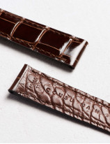 High-end leather watchstrap in shiny alligator